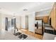 Bright kitchen with stainless steel appliances and hardwood floors, plenty of natural light at 6116 Casa Antiqua St, North Las Vegas, NV 89081