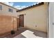 Enclosed back patio featuring neutral stucco and concrete at 6116 Casa Antiqua St, North Las Vegas, NV 89081