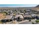 Gorgeous aerial view of the house showcasing the neighborhood, mountain views, and desert landscaping at 6832 Apogee Ridge Ct, Las Vegas, NV 89135