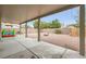 Large backyard features a covered patio and low maintenance landscaping at 7344 Jelson Falls St, Las Vegas, NV 89131