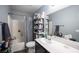 Bright bathroom with tub and shower combination plus ample storage at 7485 Rainbow Spray Dr, Las Vegas, NV 89131