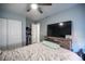 Bedroom with a rustic wood dresser and a view of the closet at 7485 Rainbow Spray Dr, Las Vegas, NV 89131