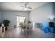 Bright dining area with access to the outside and neutral décor at 7485 Rainbow Spray Dr, Las Vegas, NV 89131