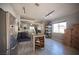 Bright kitchen area with stainless steel appliances, island, and open layout at 7485 Rainbow Spray Dr, Las Vegas, NV 89131