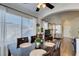 Inviting dining area with backyard views, natural light, and modern fixtures at 7608 Little Valley Ave, Las Vegas, NV 89147