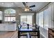 Bright dining area with hardwood floors, natural light, and backyard view at 7608 Little Valley Ave, Las Vegas, NV 89147