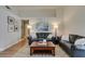 Bright living room featuring hardwood floors, neutral walls, and stylish furnishings at 7608 Little Valley Ave, Las Vegas, NV 89147