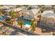 Aerial view shows pool, spa, landscaping, and community at 8106 Buffalo Clan Ct, Las Vegas, NV 89131