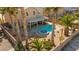 View of the backyard pool and spa, patio, desert landscaping, and block wall at 8106 Buffalo Clan Ct, Las Vegas, NV 89131