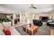 Expansive living room showcasing an open layout that connects to the kitchen, creating a modern living space at 8106 Buffalo Clan Ct, Las Vegas, NV 89131