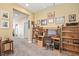 Functional home office with custom built-ins, ample shelving, and a comfortable workspace at 8106 Buffalo Clan Ct, Las Vegas, NV 89131