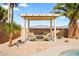 Covered patio overlooking desert landscaping with views of the mountains in the distance at 8106 Buffalo Clan Ct, Las Vegas, NV 89131