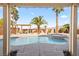 Swimming pool and hot tub with desert landscaping and a covered patio at 8106 Buffalo Clan Ct, Las Vegas, NV 89131