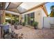 Paver patio featuring shade covering, access to interior, and enclosed storage at 8145 Mountain Forest Ct, Las Vegas, NV 89129