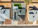 Bird's eye view of backyard, showing patio cover and solar panels; highlighting a modern, energy-efficient home design at 8212 Ducharme Ave, Las Vegas, NV 89145