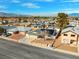 Charming exterior featuring solar panels, well-maintained front yard, and neutral-toned siding within a tidy neighborhood at 8212 Ducharme Ave, Las Vegas, NV 89145