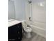 Bathroom featuring a modern vanity and a tiled shower-tub combo at 8455 W Sahara Ave # 258, Las Vegas, NV 89117