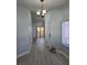 Hallway leading to a sliding glass door that brings in lots of light at 8455 W Sahara Ave # 258, Las Vegas, NV 89117