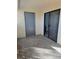 Enclosed patio shows a sliding glass door to the interior, and another door to a closet or storage area at 8455 W Sahara Ave # 258, Las Vegas, NV 89117