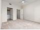 Bright bedroom with white walls, plush carpet, and two spacious closets at 9000 Las Vegas Blvd # 1245, Las Vegas, NV 89123