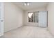 A bright bedroom with a large window and neutral carpet at 9000 Las Vegas Blvd # 1245, Las Vegas, NV 89123