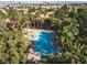 Aerial view of a community pool and hot tub surrounded by lush landscaping and mature trees at 9000 Las Vegas Blvd # 1245, Las Vegas, NV 89123