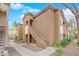 Condo exterior showing multiple levels, walkway, and desert landscaping at 9000 Las Vegas Blvd # 2138, Las Vegas, NV 89123