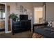 Tastefully decorated bedroom featuring a dresser and comfortable furnishings at 9012 Alpine Peaks Ave, Las Vegas, NV 89147