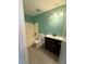 Bathroom featuring a tub, shower, sink, and commode at 904 Dianne Dr, Boulder City, NV 89005