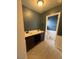 Bathroom with a double vanity sink and updated fixtures at 904 Dianne Dr, Boulder City, NV 89005