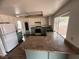 Kitchen with stainless steel appliances, granite countertops, and ample cabinet space at 904 Dianne Dr, Boulder City, NV 89005