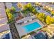 Aerial of community pool and recreation area with playground and picnic area at 9144 Epworth Ave, Las Vegas, NV 89148