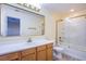 Bathroom featuring a wood vanity, sink, shower and toilet at 9144 Epworth Ave, Las Vegas, NV 89148