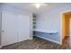 Bedroom featuring wood-look flooring, built-in shelves and closet with sliding doors at 9144 Epworth Ave, Las Vegas, NV 89148