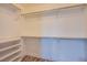 Empty walk-in closet with shelving and hanging rods at 9144 Epworth Ave, Las Vegas, NV 89148