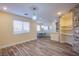 Bright and airy dining room featuring modern floors, built-in shelving, and stylish lighting at 9144 Epworth Ave, Las Vegas, NV 89148