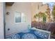 Back patio featuring a blue patterned rug, privacy wall, and access to the yard at 9144 Epworth Ave, Las Vegas, NV 89148