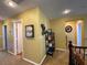 Upstairs hallway featuring carpet flooring, recessed lighting, and a decorative book shelf at 9364 Olympia Falls Ave, Las Vegas, NV 89149