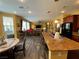 Inviting living room featuring wood floors, recessed lighting, and an open floor plan at 9364 Olympia Falls Ave, Las Vegas, NV 89149