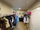 Walk-in closet offering plenty of room to organize clothing, shoes, and accessories at 9364 Olympia Falls Ave, Las Vegas, NV 89149