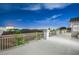 Balcony with cityscape views featuring palm trees and desert landscaping at 9795 La Cienega St, Las Vegas, NV 89183