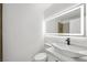 Modern bathroom featuring a vessel sink, floating vanity, and illuminated mirror at 9795 La Cienega St, Las Vegas, NV 89183