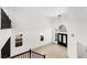 Bright entryway with hardwood style flooring, high ceilings, and a modern chandelier at 9795 La Cienega St, Las Vegas, NV 89183