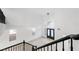 Bright entryway featuring a modern chandelier and high ceilings, leading to a double-door entrance at 9795 La Cienega St, Las Vegas, NV 89183