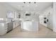 Modern kitchen featuring an island, stainless steel appliances, and bright white cabinets at 9795 La Cienega St, Las Vegas, NV 89183