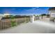 Expansive rooftop patio with pool, hot tub, and stunning city views at night at 9795 La Cienega St, Las Vegas, NV 89183