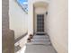 Charming front entrance with steps leading to the doorway at 10651 Streamside Ave, Las Vegas, NV 89129