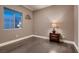 Minimalist bedroom with hardwood floors, neutral walls and ample natural light at 11831 Saverio Ave, Las Vegas, NV 89138