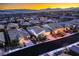 A high angle street view of single-Gathering homes featuring desert landscaping and mountain views at 11831 Saverio Ave, Las Vegas, NV 89138