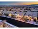 A high angle street view of charming single-Gathering homes featuring desert landscaping and mountain views at 11831 Saverio Ave, Las Vegas, NV 89138